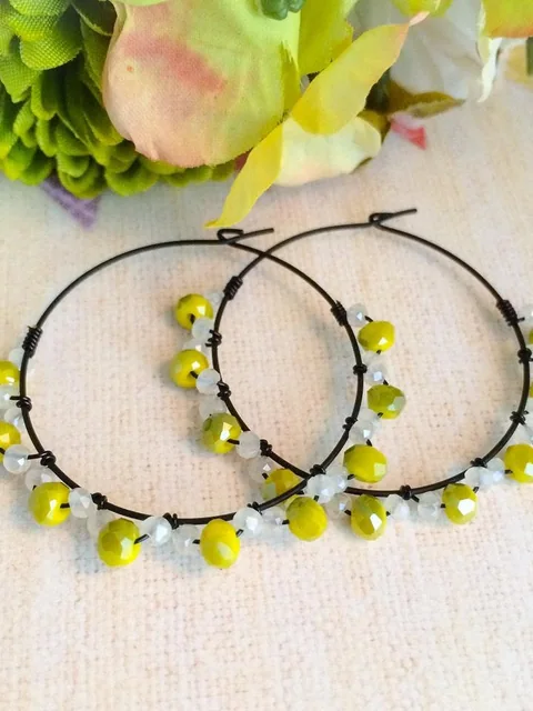 Lime beaded black hoops by Ritu Java