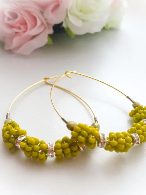 Yellow beaded gold hoops by Ritu Java